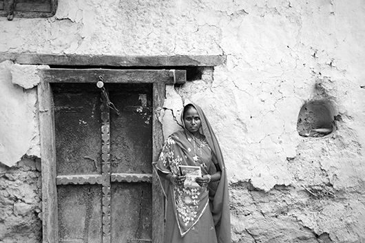 woman holding book varanasi uttar pradesh India Asia