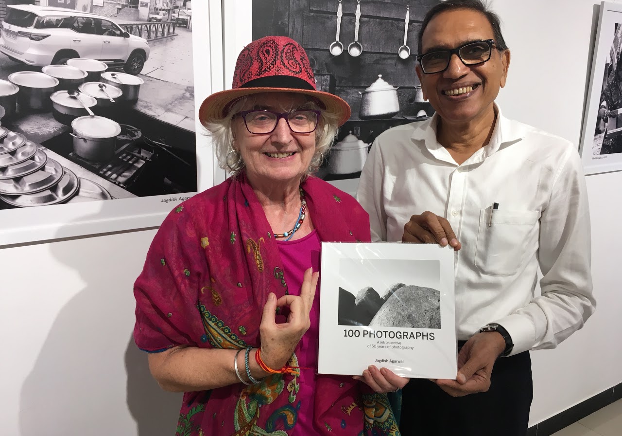 Christel Haller photography teacher from Germany with Jagdish Agarwal book of 100 photographs at his 14th one man show of photographs at Jehangir Art Gallery, Mumbai.